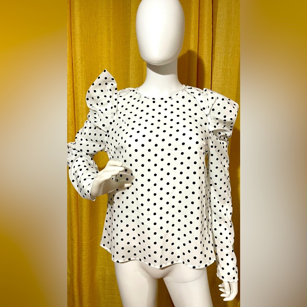 White pearl blouse with black dots